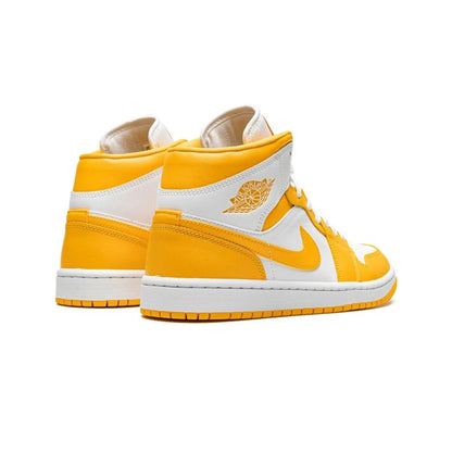 Jordan 1 Mid University Gold